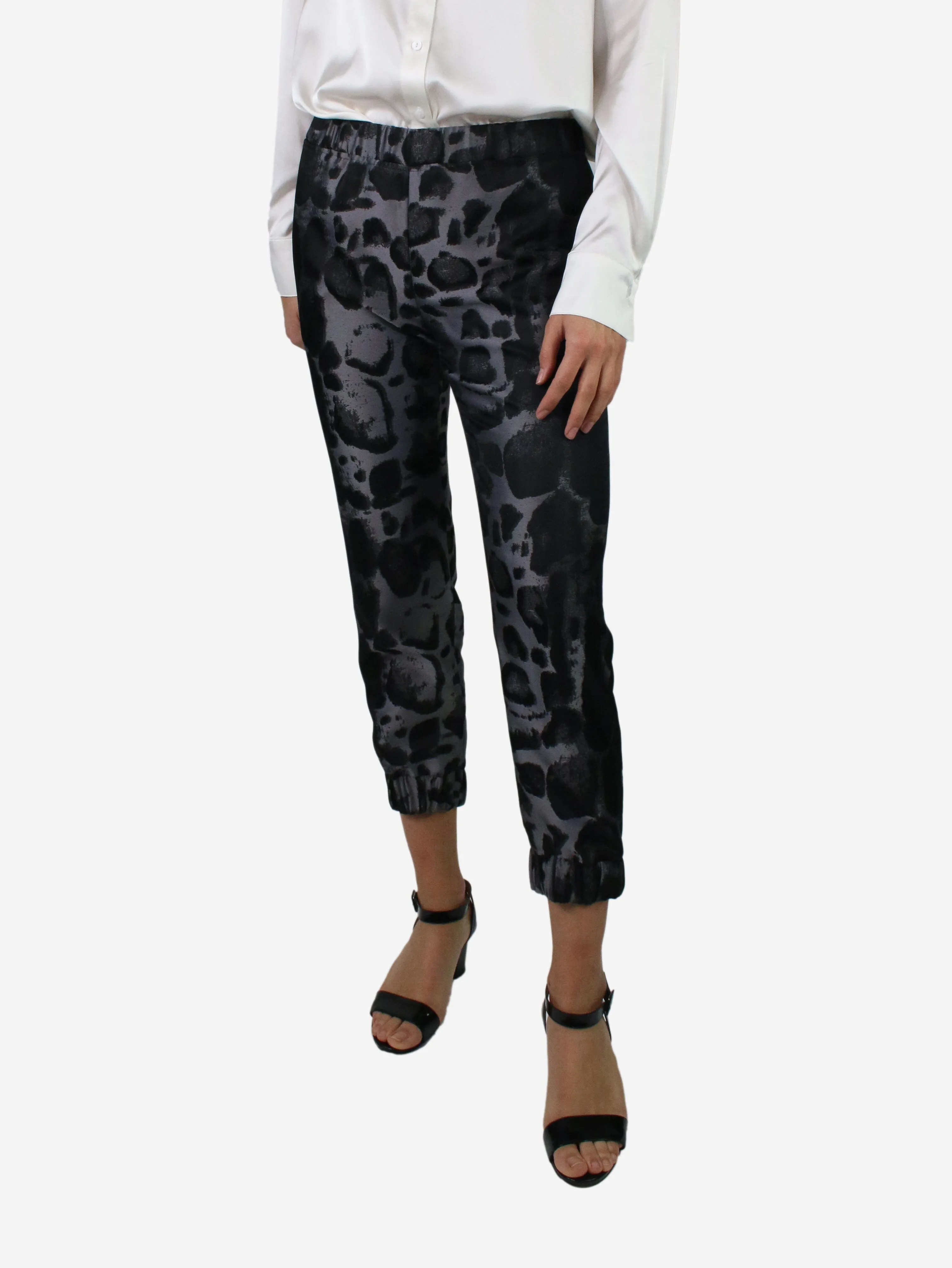 Black elasticated animal print trousers - size XS