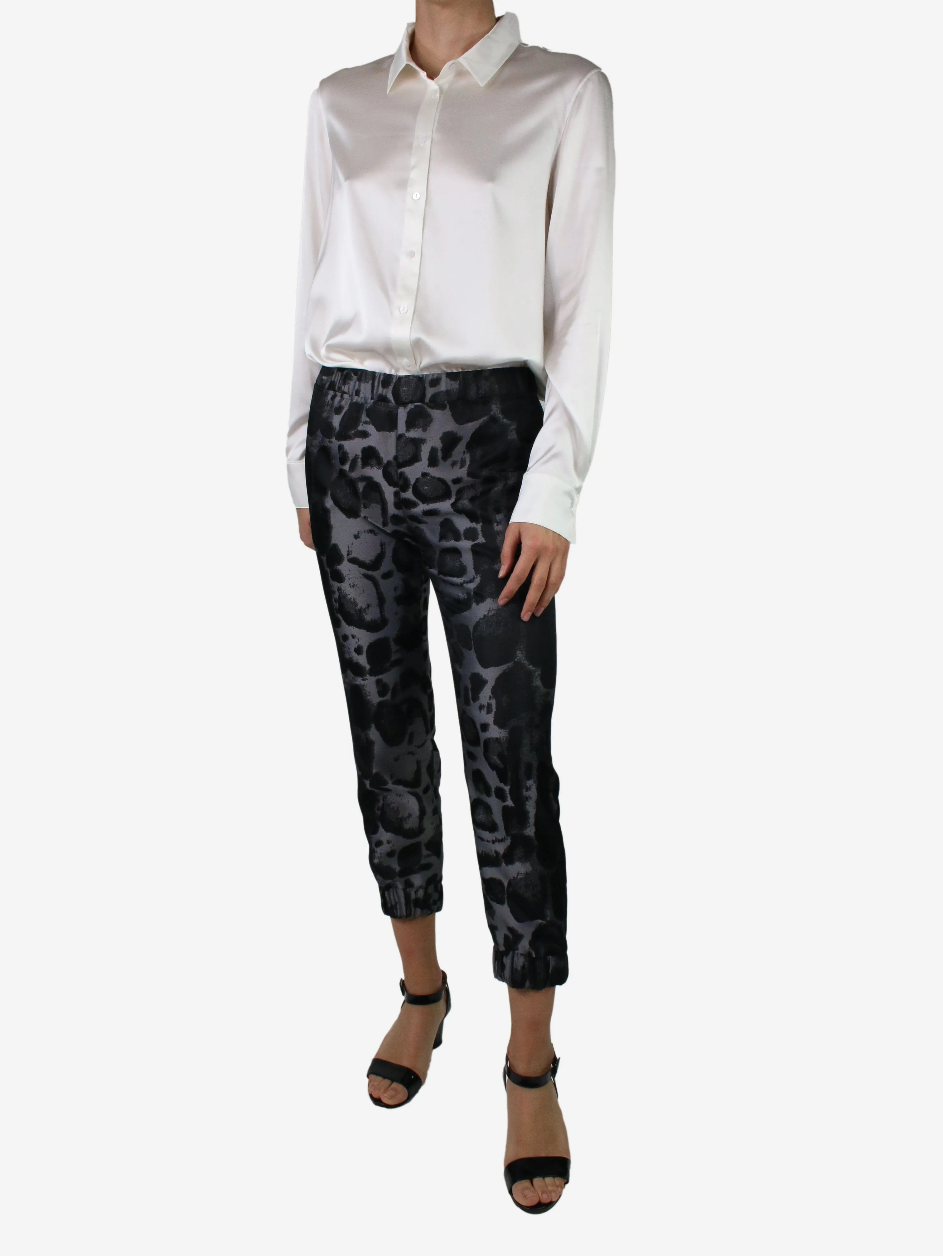 Black elasticated animal print trousers - size XS